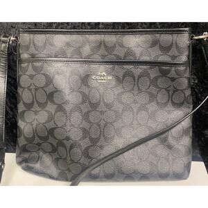 Black Crossbody Coach Purse Pebbled Leather Logo Design